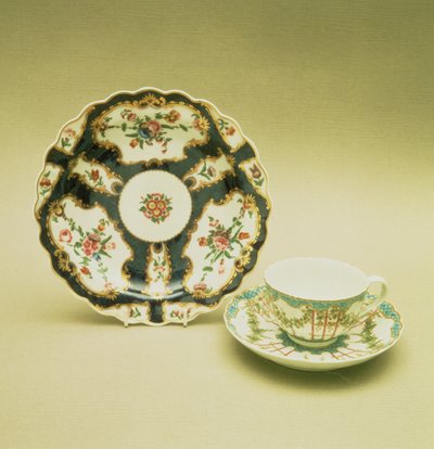 Worcester porcelain plate with scale blue decoration, 1768; teacup and saucer with hop trellis-work decoration, c.1770 by English School